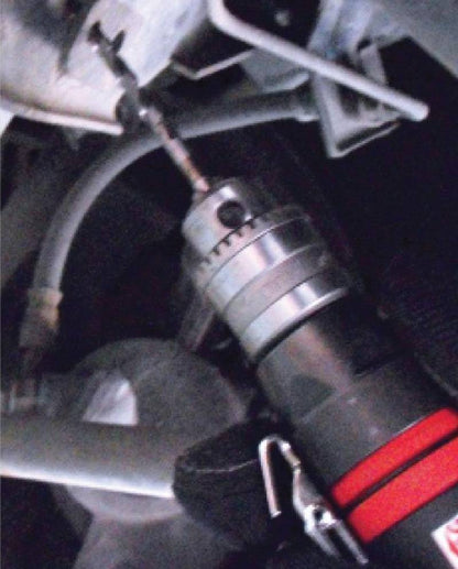 a close up of a fuel pump on a car